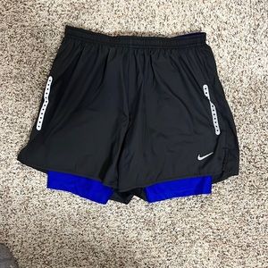 Nike 2-in-1 running shorts. Size small.